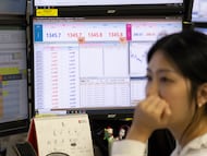 Operadora de Bolsa en la entidad financiera Hana Bank en Seúl.