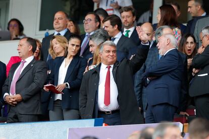 Barcelona president Joan Laporta greets before the start of the match.