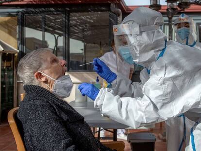 A woman gets a PCR test at a senior care home in Barcelona.