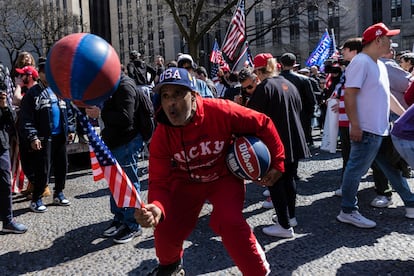 A Trump supporter spinning basketballs at protest held in Collect Pond Park across the street from the Manhattan District Attorney's office in New York on Tuesday, April 4, 2023