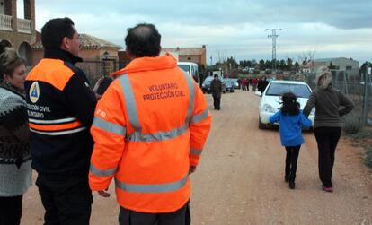 Ossa de Montiel residents on one of the town’s streets after the quake.