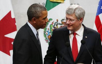 Obama y Harper, el año pasado en México.