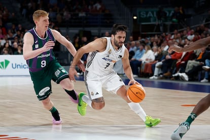 Facundo Campazzo maneja el balón ante Alberto Díaz.