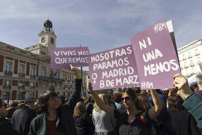 Women gather in central Madrid on Wednesday.