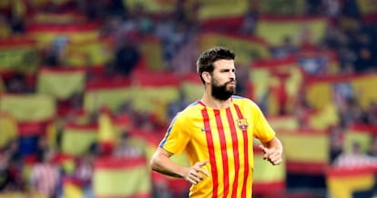 Piqué, durante el calentamiento.