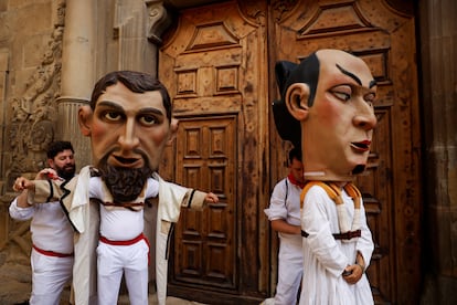 "Cabezudos" (Big heads) prepare to parade during San Fermin in 2024.
