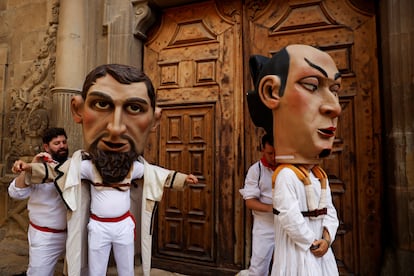 "Cabezudos" (Big heads) prepare to parade during San Fermin festival's "Comparsa de gigantes y cabezudos" (Parade of the Giants and Big Heads) in Pamplona on Monday. 