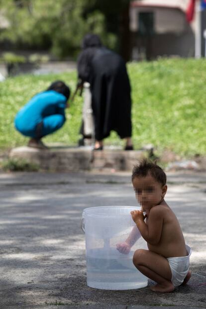 A small child living in the park since July 10.