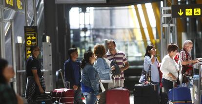 Passengers at Adolfo Suárez Barajas Airport in Madrid.