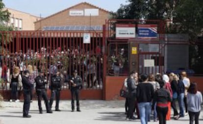 People gather for a ceremony at Ciudad de Jaén High School on Monday.