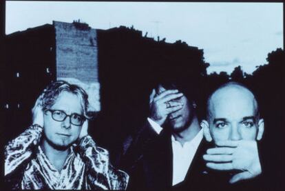 Mike Mills, Peter Buck y Michael Stipe, en una fotografía de los años noventa.