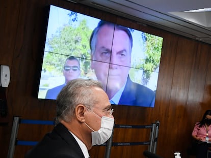 Painel eletrônico exibe vídeo do presidente Jair Bolsonaro diante do relator da CPI da Pandemia, Renan Calheiros, durante sessão em 8 de junho.