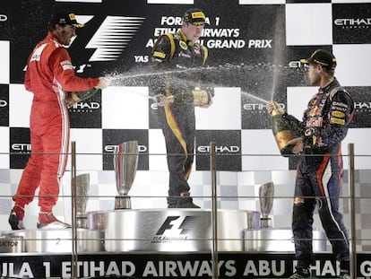 Alonso, Raikkonen y Vettel, durante los festejos del podio