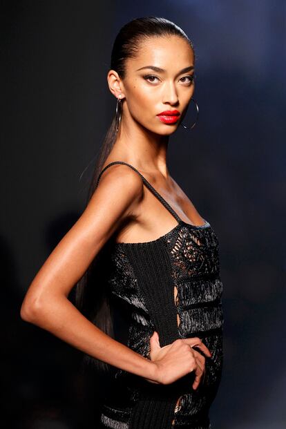 A model presents a creation by French designer Jean Paul Gaultier as part of his Spring/Summer 2013 women's ready-to-wear fashion show during Paris fashion week