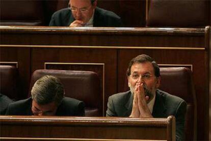 El presidente del PP, Mariano Rajoy, durante el pleno de ayer en el Congreso.