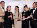 (From L) Producers Peter Spears, Frances McDormand, Chloe Zhao, Mollye Asher and Dan Janvey, winners of the award for best picture for "Nomadland," pose in the press room at the Oscars on April 25, 2021, at Union Station in Los Angeles. (Photo by Chris Pizzello / POOL / AFP)