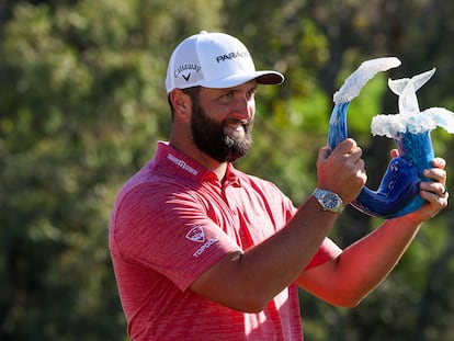 Jon Rahm, with the Sentry Tournament of Champions trophy.