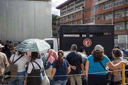 Relatives of detained people wait outside the Bolivarian National Police headquarters in Caracas, Venezuela, on August 1, 2024.