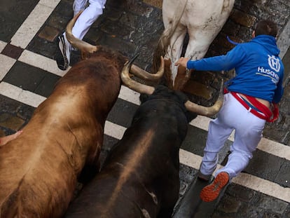 El séptimo encierro de San Fermín, en imágenes