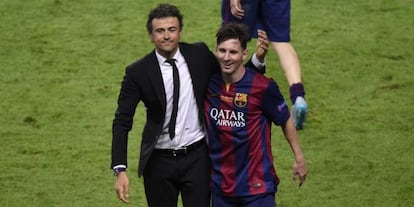 Luis Enrique y Messi celebran la Champions en Berl&iacute;n.