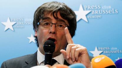 Sacked Catalan leader Carles Puigdemont attends a news conference at the Press Club Brussels Europe in Brussels, 