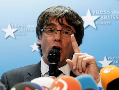 Sacked Catalan leader Carles Puigdemont attends a news conference at the Press Club Brussels Europe in Brussels, 
