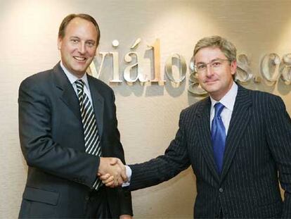 Enrique Goñi, director de Caja Navarra, junto a Craig Hevey, <i>managing director </i>de Wachovia.