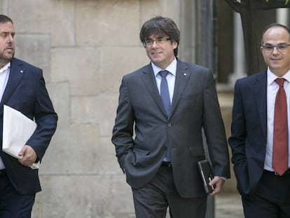 Oriol Junqueras, Carles Puigdemont y Jordi Turull acuden a la reuni&oacute;n del Gobierno. 