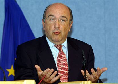 Joaquín Almunia, durante la conferencia de prensa celebrada ayer en Bruselas.