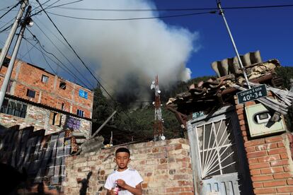 Smoke rises over the city from forest fires in Bogota, Colombia, January 24, 2024