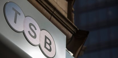 FILE PHOTO: A sign is displayed outside a branch of the TSB bank in central London