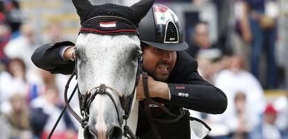 The Syrian Ahmad knows Hamcho riding Wonderboy during the equestrian jump test.
