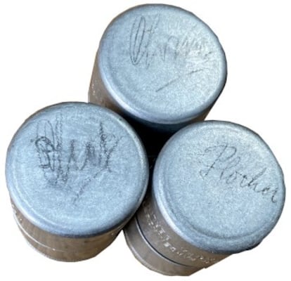 The cans that contained the old rolls of 35mm photographs, which cost John Knowles $44.

