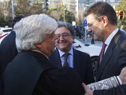 Enric Millo (al centre), amb el ministre Rafael Catalá (dreta).