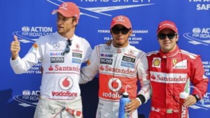 Button, Hamilton y Massa posan tras la 'pole'.