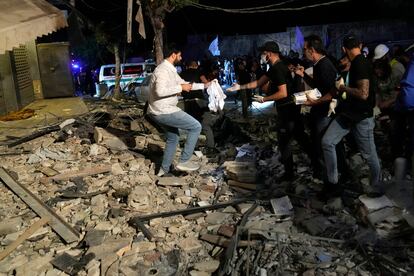 Civilians in the area where the Israeli air strike on Beirut took place.