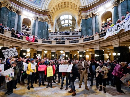 Protesters are seen in the Wisconsin Capitol Rotunda during a march supporting overturning Wisconsin's near total ban on abortion, Jan. 22, 2023, in Madison, Wis.