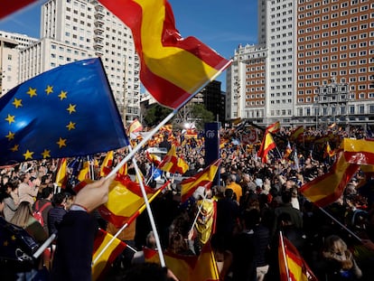 Protestors wave Spanish and European flags during a demonstration called by the opposition party Partido Popular (PP) against the government's amnesty law for people involved in Catalonia's failed 2017 independence bid, and "in defense of a country of free and equal citizens", on the Plaza de Espana square in Madrid, on January 28, 2024. (Photo by OSCAR DEL POZO / AFP)