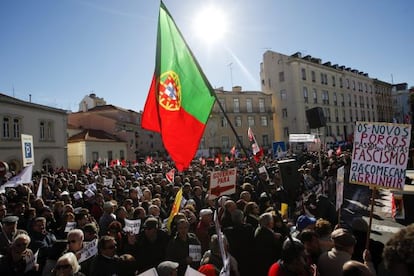 Protestors outside the Portuguese parliament on Tuesday as the 2014 budget was being approved.