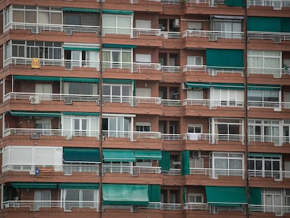 Pro-independence flags hang from an apartment block in Barcelona.