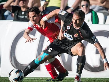 Assulin y José en el Racing-Girona de la pasada temporada.