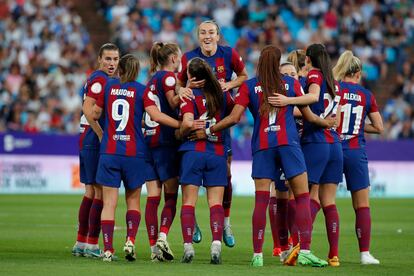 The Barcelona players celebrate the seventh goal against Real Sociedad.