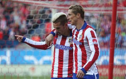 Griezmann y Torres celebran el segundo gol del Atlético.
