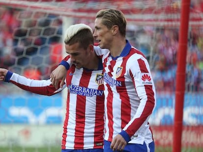 Griezmann y Torres celebran el segundo gol del Atlético.