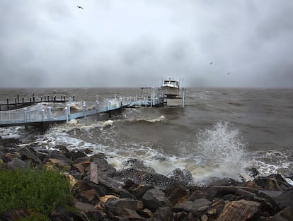Waves generated by Tropical Storm Ophelia crash up on the banks of the Potomac River along Irving Avenue in the town of Colonial Beach in Westmoreland County, Va., on Saturday, Sept. 23, 2023.