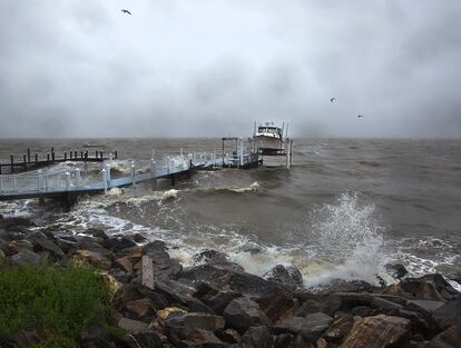 Waves generated by Tropical Storm Ophelia crash up on the banks of the Potomac River along Irving Avenue in the town of Colonial Beach in Westmoreland County, Va., on Saturday, Sept. 23, 2023.