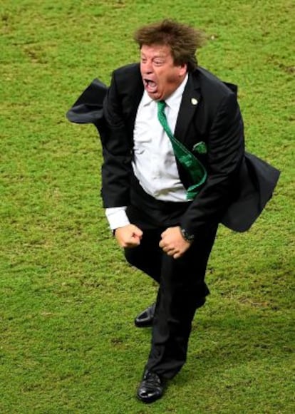 Miguel Herrera celebrates one of Mexico’s goals against Croatia.