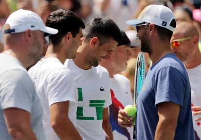 Djokvic, junto a Alcaraz durante un acto en Flushing Meadows.