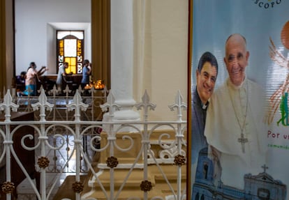 A poster featuring Bishop Rolando Alvarez and Pope Francis hangs inside the Cathedral in Matagalpa, Nicaragua, Aug. 19, 2022.