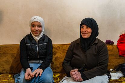 Amira (not her real name) and her grandmother, internally displaced in a camp in northwest Syria. After her parents were killed in a bombing raid, her grandmother and grandfather became Amira's sole caretakers.